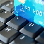 Credit card on computer keyboard.