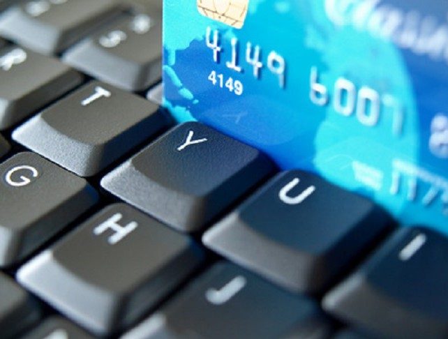 Credit card on computer keyboard.