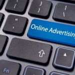 concepts of online advertising, with message on keyboard.