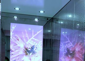 Gli specchi degli ascensori diventano schermi touch-screen multimediali