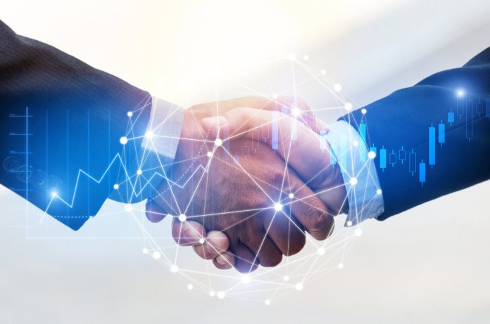 Deal. business man shaking hands with effect global network link connection and graph chart of stock market graphic diagram, digital technology, internet communication, teamwork, partnership concept partner tecnologico