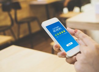 Customer review rating business concept, Woman hand using mobile phone