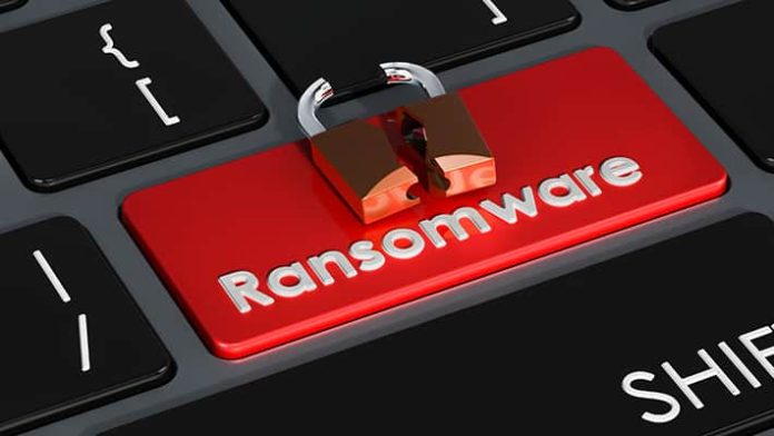 Ransomware red button on keyboard, 3D rendering Ransomware red button on keyboard, 3D rendering