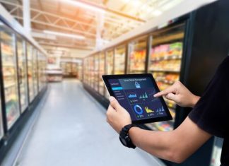 Smart,Retail,Management,System.worker,Hands,Holding,Tablet,On,Blurred,Supermartket