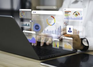 An analyst uses a computer and dashboard for data business analysis and Data Management System with KPI and metrics connected to the database for technology finance, operations, sales, marketing