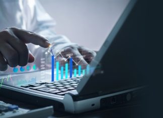 Businessman,Analyzing,Virtual,Digital,Graphics.,Data,Management,System,To,Make
