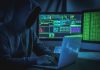 Wanted hackers coding virus ransomware using laptops and computers. Inferno Drainer Reloaded