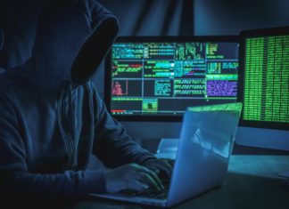 Wanted hackers coding virus ransomware using laptops and computers. Inferno Drainer Reloaded
