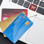 top-view-laptop-with-credit-card-phishing-hook