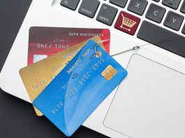 top-view-laptop-with-credit-card-phishing-hook - Device Code Phishing: