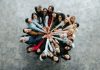 Top,View,Of,A,Diverse,Team,Of,People,Joining,Hands