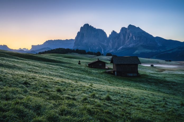 Alpe di Siusi at sunny morning sunrise, Dolomites mountains, Italy Alpe di Siusi